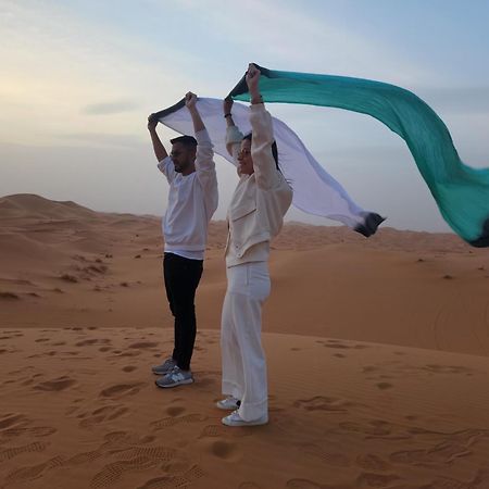 Riadsuerteloca Merzouga Hassilabied 외부 사진 The flag of the United Arab Emirates
